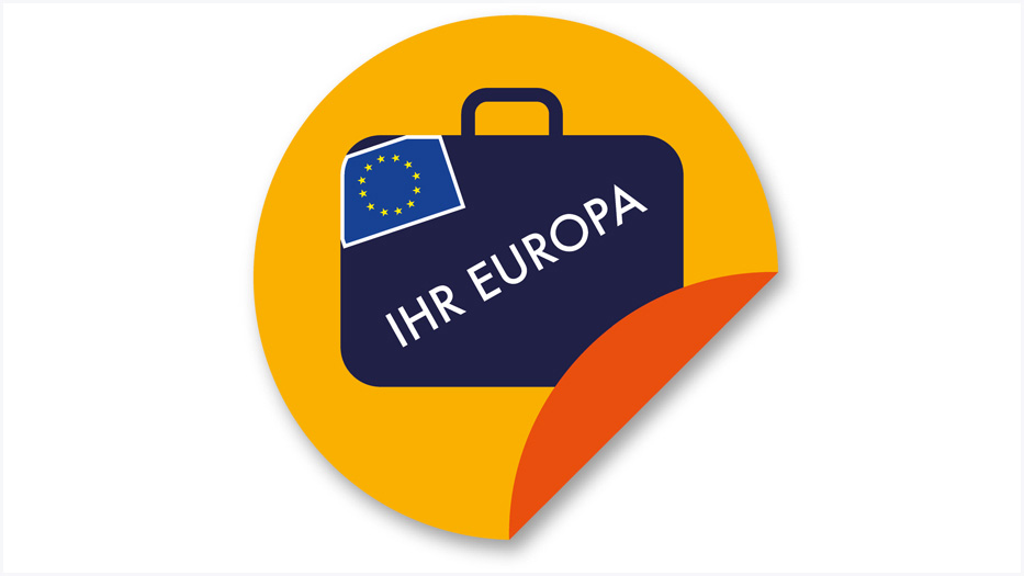 Ein Koffer mit der die Aufschrift "IHR EUROPA" und der Europaflagge